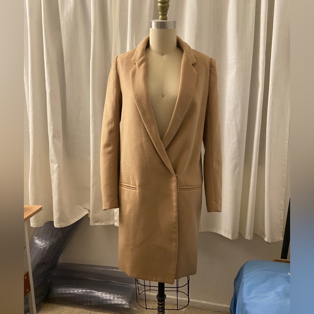 Beige coat, fits like a size XS-S. Unknown brand from online long time ago
